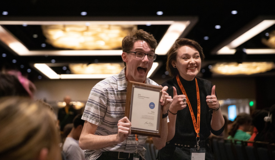  Talon Yearbook Editor-in-Chief Rhett Cunningham celebrates holding the Pacemaker Finalist award